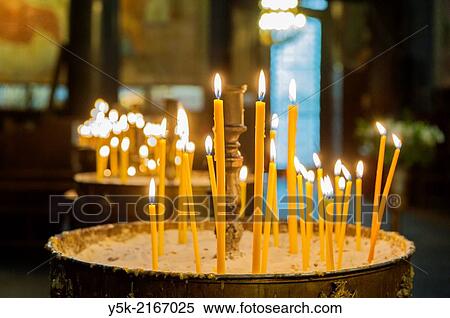 Sofia, Bulgaria. Candles on a large candlestick inside the interior of the Orthodox-Christian Sveta Nedalya church, Down Town Sofia. View Large Photo Image Stock Photography - Sofia, Bulgaria. Candles on a large candlestick inside the interior of the Orthodox-Christian Sveta Nedalya church, Down Town Sofia.. Fotosearch