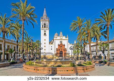 Spain Square and Church of San Juan Bautista, La Palma del Condado, Huelva-province, Region of Andalusia, Spain, Europe. View Large Photo Image Picture - Spain Square and Church of San Juan Bautista, La Palma del Condado, Huelva-province, Region of Andalusia, Spain, Europe.. Fotosearch