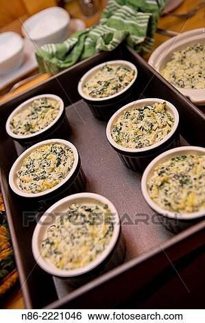 spinach parmesan timbale preparation. View Large Photo Image Stock Photograph - spinach parmesan timbale preparation.. Fotosearch