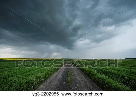 Stock Photography - Spring thunderstom over fields, Prudnik County, Opole Voivodship, Silesia, Poland.. Fotosearch
