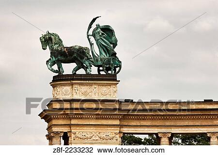 Stock Image - Statue on the Heroes´ Square monument in Budapest, Hungary representing a female figure of Peace.. Fotosearch