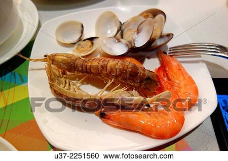 Steamed prawns and clams View Large Photo Image Stock Image - Steamed prawns and clams. Fotosearch