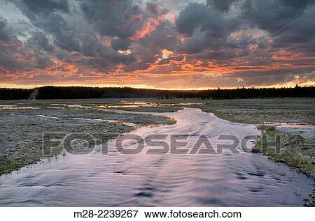 Stream at sunset near Firehole Lake, Yellowstone National Park Wyoming. View Large Photo Image Stock Photo - Stream at sunset near Firehole Lake, Yellowstone National Park Wyoming.. Fotosearch