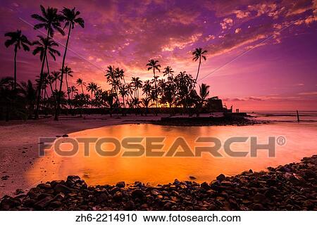 Sunset over Pu´uhonua O Honaunau National Historic Park (City of Refuge), Kona Coast, Hawaii USA. View Large Photo Image Stock Image - Sunset over Pu´uhonua O Honaunau National Historic Park (City of Refuge), Kona Coast, Hawaii USA.. Fotosearch