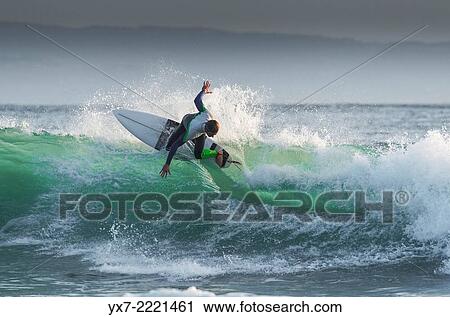 Stock Image - Surfer. Tarifa, Cadiz, Costa de la Luz, Andalusia, Spain, Europe.. Fotosearch