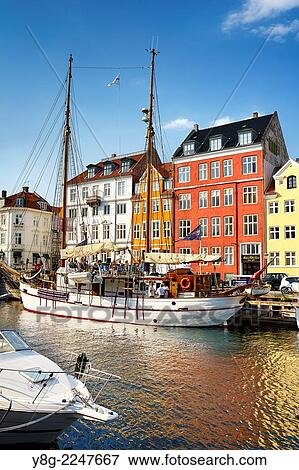 The boat in Nyhavn Canal, Copenhagen, Denmark. View Large Photo Image Stock Photo - The boat in Nyhavn Canal, Copenhagen, Denmark.. Fotosearch