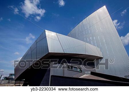 The Imperial War Museum North, Salford Quays, Manchester, England. View Large Photo Image Picture - The Imperial War Museum North, Salford Quays, Manchester, England.. Fotosearch