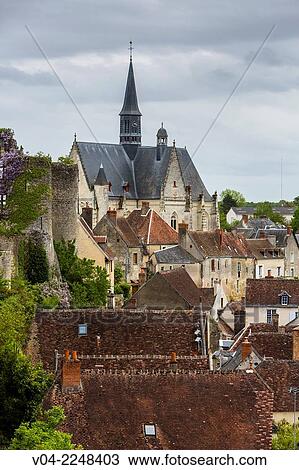 The picturesque village of Montrésor with the church Saint-Jean-Baptiste de Montrésor, Indre-et-Loire, France, Europe View Large Photo Image Stock Image - The picturesque village of Montrésor with the church Saint-Jean-Baptiste de Montrésor, Indre-et-Loire, France, Europe. Fotosearch