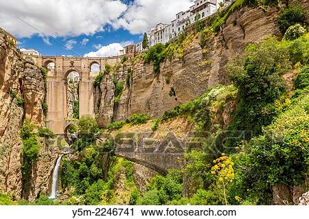 The Puente Nuevo bridge over Guadalevín River in El Tajo gorge, Ronda, Malaga province, Andalusia, Spain, Europe. View Large Photo Image Stock Image - The Puente Nuevo bridge over Guadalevín River in El Tajo gorge, Ronda, Malaga province, Andalusia, Spain, Europe.. Fotosearch