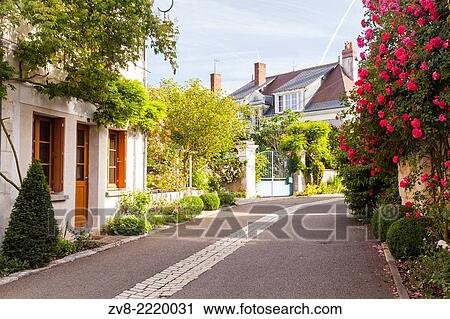 Stock Image - The village of Chedigny, France. The village holds a rose festival every May.. Fotosearch