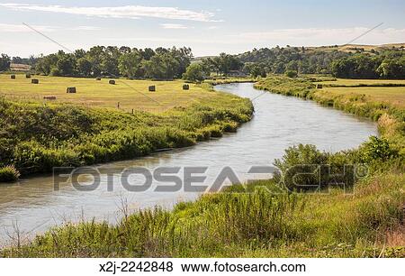 Stock Photo - Thedford, Nebraska - The Middle Loup River in the Nebraska Sandhills. The sandhills is a prairie region that sits atop the Ogallala Aquifer.. Fotosearch