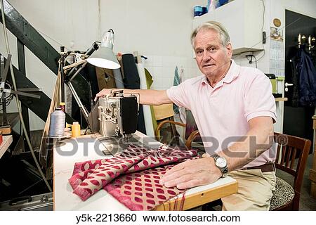 Tilburg, Netherlands. The 72 year old ´Boy´ still works as an independent upholsterer in his own workshop, down town Tilburg, where he refurbishes and upholsters all kinds of chairs. View Large Photo Image Stock Image - Tilburg, Netherlands. The 72 year old ´Boy´ still works as an independent upholsterer in his own workshop, down town Tilburg, where he refurbishes and upholsters all kinds of chairs.. Fotosearch