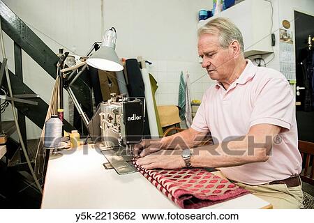 Tilburg, Netherlands. The 72 year old ´Boy´ still works as an independent upholsterer in his own workshop, down town Tilburg, where he refurbishes and upholsters all kinds of chairs. View Large Photo Image Stock Image - Tilburg, Netherlands. The 72 year old ´Boy´ still works as an independent upholsterer in his own workshop, down town Tilburg, where he refurbishes and upholsters all kinds of chairs.. Fotosearch