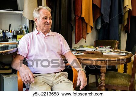 Tilburg, Netherlands. The 72 year old ´Boy´ still works as an independent upholsterer in his own workshop, down town Tilburg, where he refurbishes and upholsters all kinds of chairs. View Large Photo Image Stock Photo - Tilburg, Netherlands. The 72 year old ´Boy´ still works as an independent upholsterer in his own workshop, down town Tilburg, where he refurbishes and upholsters all kinds of chairs.. Fotosearch