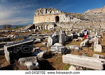 Tourist at the ancient ruins in Miletus, Milet, Aydin Province, Turkey, Europe. View Large Photo Image Stock Image - Tourist at the ancient ruins in Miletus, Milet, Aydin Province, Turkey, Europe.. Fotosearch
