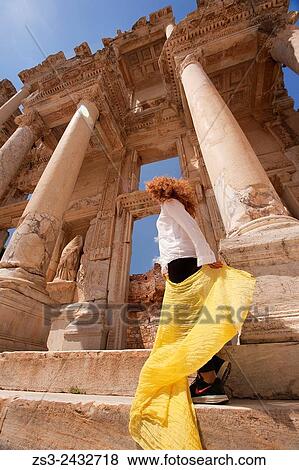 Tourist in front of the Library of Celsus at the Roman ruins of Ephesus, Efes, Selcuk, Kusadasi, Turkey, Europe. View Large Photo Image Stock Photo - Tourist in front of the Library of Celsus at the Roman ruins of Ephesus, Efes, Selcuk, Kusadasi, Turkey, Europe.. Fotosearch