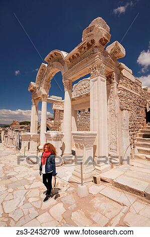 Tourist in front of the Temple of Hadrian at the Roman ruins of Ephesus, Efes, Selcuk, Kusadasi, Turkey, Europe. View Large Photo Image Stock Photo - Tourist in front of the Temple of Hadrian at the Roman ruins of Ephesus, Efes, Selcuk, Kusadasi, Turkey, Europe.. Fotosearch