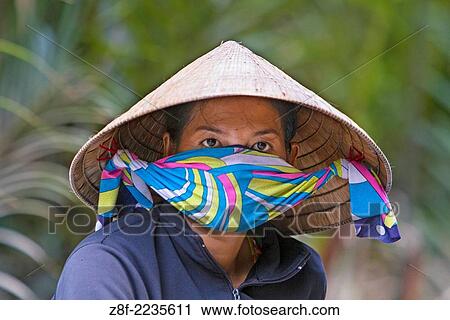 Traditional boats carry freight on the Mekong River and canals near Ben Tre. View Large Photo Image Stock Image - Traditional boats carry freight on the Mekong River and canals near Ben Tre.. Fotosearch