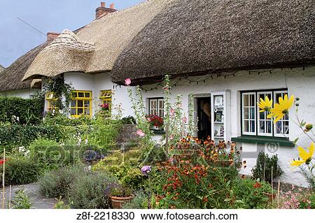 Traditional thatched roof cottage. View Large Photo Image Stock Image - Traditional thatched roof cottage.. Fotosearch