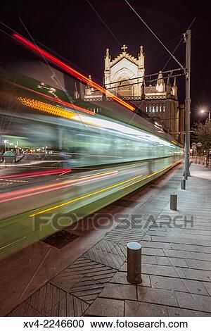 Tram trails with Cathedral Background. Vitoria-Gasteiz, Alava, Basque Country, Spain. View Large Photo Image Stock Image - Tram trails with Cathedral Background. Vitoria-Gasteiz, Alava, Basque Country, Spain.. Fotosearch