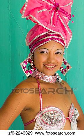 Stock Photo - Trinidad Cuba beautiful dancer in costume portrait with headress and color from tourist show 12.. Fotosearch