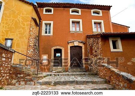Typical exterior Facade in the medieval Village Roussillon, Provence, France. View Large Photo Image Stock Image - Typical exterior Facade in the medieval Village Roussillon, Provence, France.. Fotosearch