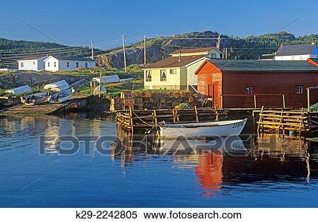 Typical fishing village- Harbour, boats, fish shanties and piers, Salvage, NL, Canada. View Large Photo Image Stock Photography - Typical fishing village- Harbour, boats, fish shanties and piers, Salvage, NL, Canada.. Fotosearch
