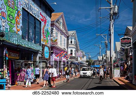 Stock Image - USA, Massachusetts, Cape Cod, Provincetown, Commercial Street, shops and shoppers.. Fotosearch
