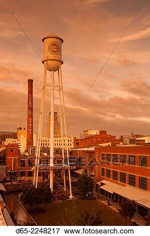 Stock Photo - USA, North Carolina, Durham, American Tobacco and City Center Complex, mixed use space in renovated tobacco warehouses, late afternoon.. Fotosearch