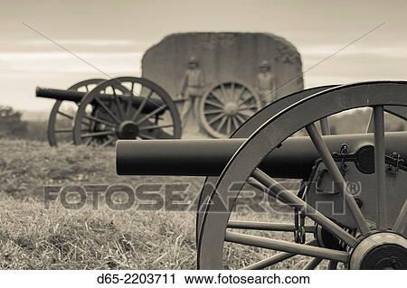 USA, Pennsylvania, Gettysburg, Battle of Gettysburg, battlefield monument and Civil War cannon, dawn. View Large Photo Image Stock Image - USA, Pennsylvania, Gettysburg, Battle of Gettysburg, battlefield monument and Civil War cannon, dawn.. Fotosearch