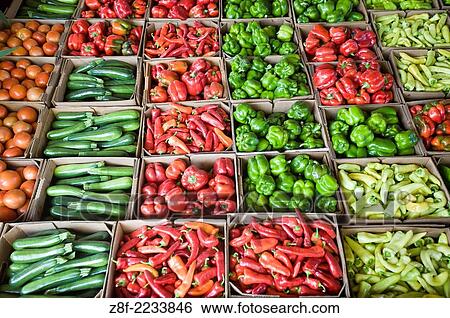 Vegetables being sold at a produce auction. View Large Photo Image Stock Photograph - Vegetables being sold at a produce auction.. Fotosearch