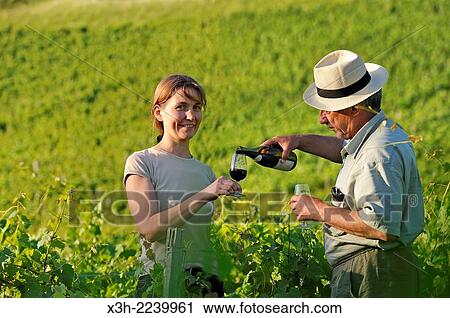 Veronique Dupasquier, wine grower, tasting wine in the vineyard at Jongieux, Savoie department, Rhone-Alpes region, France, Europe. View Large Photo Image Stock Image - Veronique Dupasquier, wine grower, tasting wine in the vineyard at Jongieux, Savoie department, Rhone-Alpes region, France, Europe.. Fotosearch
