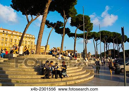 Stock Photograph - Via dei Fori Imperiali street, in front of Foro di Traiano, Forum Traiani, Trajan´s Forum, ancient Rome, Italy.. Fotosearch