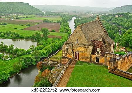 Stock Image - view of Dordogne River Valley with Notre Dame de Beynac Chapel, from Beynac Castle, Dordogne Department, Aquitaine, France.. Fotosearch