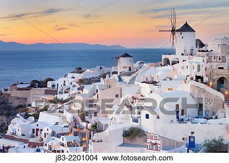 View of Oia with traditional greek windmill of Santorini, Oia Village, Santorini, Aegean Island, Cyclades Islands, Greek Islands, Greece, Europe. View Large Photo Image Picture - View of Oia with traditional greek windmill of Santorini, Oia Village, Santorini, Aegean Island, Cyclades Islands, Greek Islands, Greece, Europe.. Fotosearch