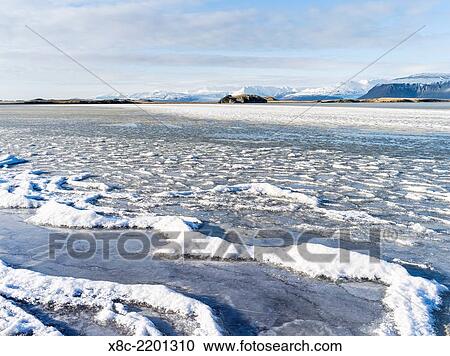 View over the frozen Homafoerdur towards Vatnajoekull NP from Hoefn during winter. europe, northern europe, scandinavia, iceland, February. View Large Photo Image Stock Image - View over the frozen Homafoerdur towards Vatnajoekull NP from Hoefn during winter. europe, northern europe, scandinavia, iceland, February.. Fotosearch