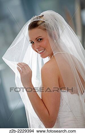 Picture - Wedding dress worn by a model.. Fotosearch