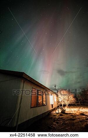 Winter Icelandic landscape with Northern lights background. Iceland. View Large Photo Image Stock Photo - Winter Icelandic landscape with Northern lights background. Iceland.. Fotosearch