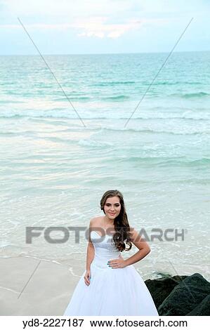 Young Quinceañera in Miami Beach at sunrise, FLorida, USA View Large Photo Image Stock Photo - Young Quinceañera in Miami Beach at sunrise, FLorida, USA. Fotosearch