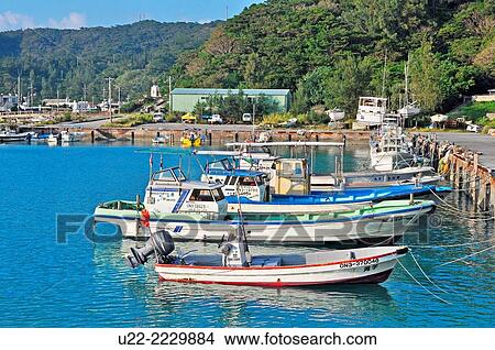 Picture - Zamami, Okinawa, Japan: fishing boats at the port. Fotosearch