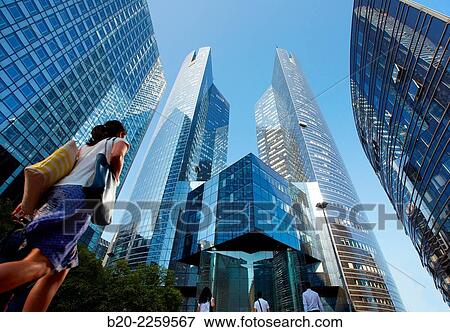 Stock Photo - Employees coming to work. SociÃ©tÃ© GÃ©nÃ©rale building. Office buildings. La Defense. Paris. France. Europe.. Fotosearch