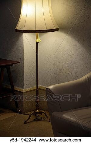 floor lamp next to the sofa View Large Photo Image Picture - floor lamp next to the sofa. Fotosearch