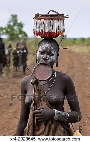 Mursi woman in Omo Valley, Ethiopia View Large Photo Image Stock Photography - Mursi woman in Omo Valley, Ethiopia. Fotosearch