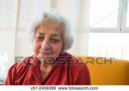 Stock Photo - Portrait of elderly woman in a nursing home.. Fotosearch