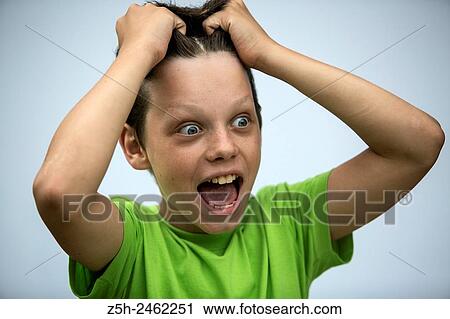 Stock Image - Russian Federation. Belgorod region. The boy with expressive face.. Fotosearch