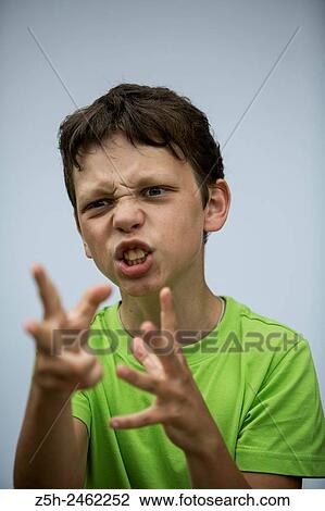 Stock Image - Russian Federation. Belgorod region. The boy with expressive face.. Fotosearch