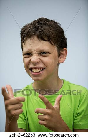 Russian Federation. Belgorod region. The boy with expressive face. View Large Photo Image Stock Image - Russian Federation. Belgorod region. The boy with expressive face.. Fotosearch