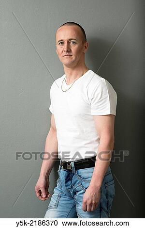 Stock Image - Studio Tuinstraat, Tilburg, Netherlands. The 42 year old Â´BÂ´ regularly cross dresses himself as a woman. Wardrobe aswell as make up are done.. Fotosearch