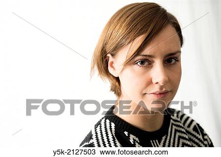 Studio Tuinstraat, Tuinstraat, Tilburg, Netherlands. Studio portrait of an young, attractive, serious looking brunette woman. View Large Photo Image Stock Image - Studio Tuinstraat, Tuinstraat, Tilburg, Netherlands. Studio portrait of an young, attractive, serious looking brunette woman.. Fotosearch