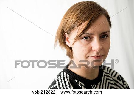 Studio Tuinstraat, Tuinstraat, Tilburg, Netherlands. Studio portrait of an young, attractive, serious looking brunette woman. View Large Photo Image Stock Image - Studio Tuinstraat, Tuinstraat, Tilburg, Netherlands. Studio portrait of an young, attractive, serious looking brunette woman.. Fotosearch